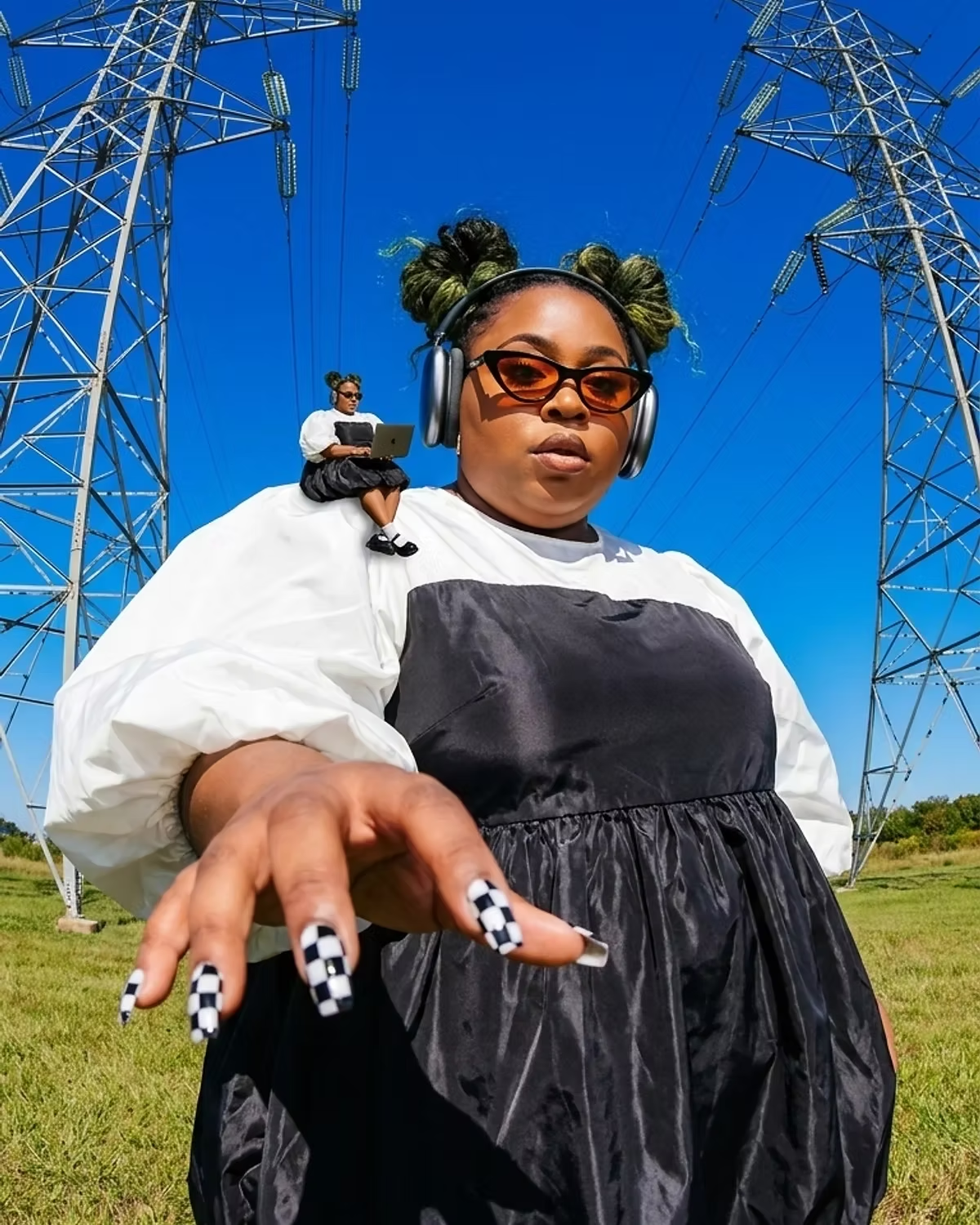 Editorial portrait under power lines with headphones